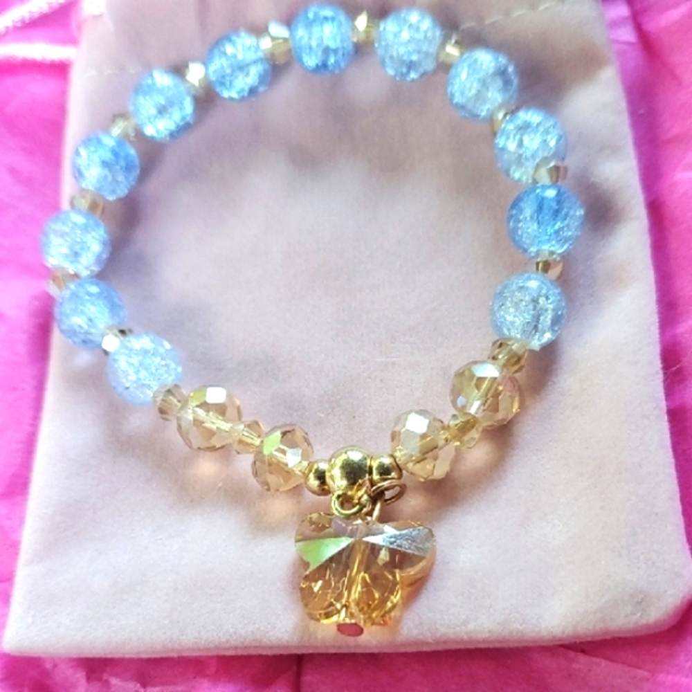 Bracelets (2) 1 Blue And Gold/ 1 Red Blue And Gold